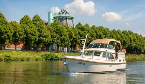Motorboat sailing in Dutch Limburg